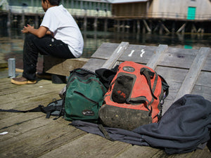 Sagebrush Dry Gear backpacks on dock